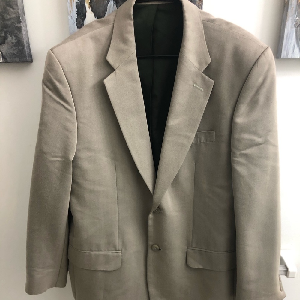 Tan men’s blazer by Perry Ellis